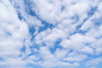 Blue sky with white clouds by daylight in spring