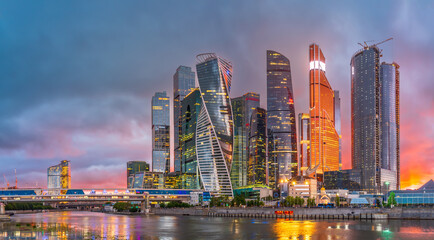 Obraz premium High buildings of Moscow-City at Moskva River at summer sunset, Russia.