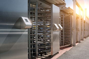 Many turnstiles through which fans can enter the stadium using an electronic fan card.