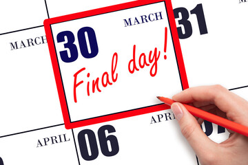 Hand writing text FINAL DAY on calendar date March 30.  A reminder of the last day. Deadline. Business concept.