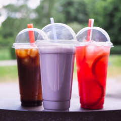 Summer non alcohol drinks close up. Aperol shpritz, blueberry milkshake, bumble bee ice coffee