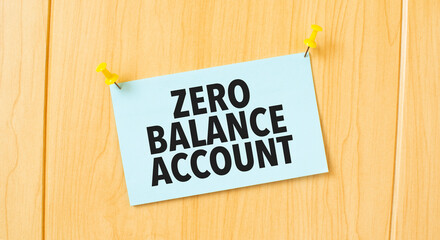 ZERO BALANCE ACCOUNT sign written on sticky note pinned on wooden wall