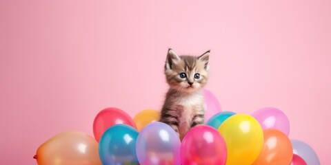 kitten with colorful balloons on a pink background. banner. copy space for text.children party.surprise. Happy birthday. AI generated