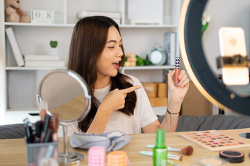 Beautiful women with social media influences recommend products and make-up accessories to be more beautiful, Recording vlog video live streaming, Online business of beauty bloggers.