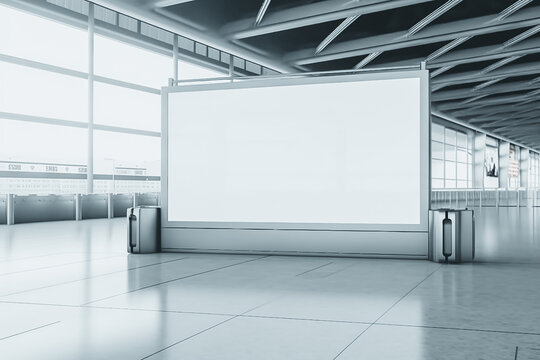 Large blank white advertising billboard inside airport, for product display and business marketing mock up