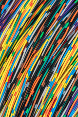 Network of colorful electrical telecommunication cables as a background