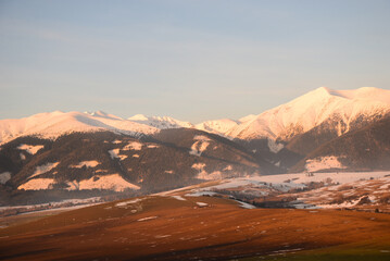 Fototapeta na wymiar View from Nicovo to West tatras near Liptovsky Mikulas in the winter and Krivan. Slovakia, Liptov region.