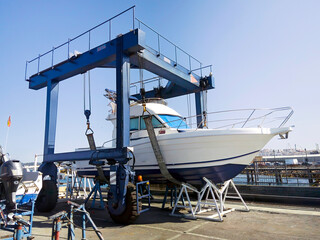 motorboat yacht  in shipyard  for repair and maintenance in marina port