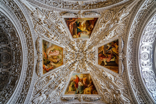 Salzburg, Austria - 06.01.2023: ceiling of the beautiful Salzburg cathedral inside with colorful paintings and nice sunlight