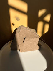 Background for cosmetics of natural beige color. Stone podium on a beige background. Front view.