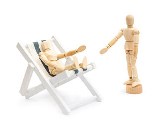 Toy deck chair with wooden mannequins on white background