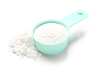 Scoop with amino acid supplement on white background