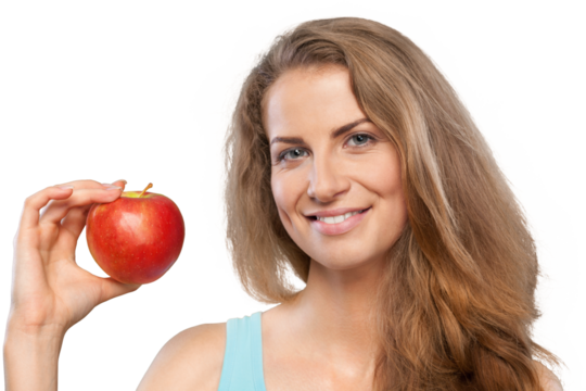 Young woman holding an apple