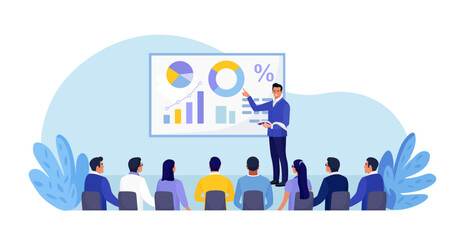 Business Training, Coaching and Education. Mentor Presenting Charts, Diagrams and Reports before Audience. Coach Speaking before Business People at Conference, Lecture. Employees Meeting at Seminar