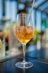 Refreshing orange cocktail drink in bar