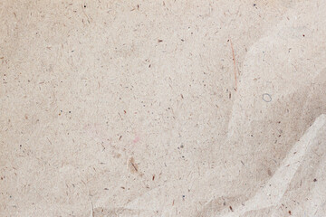 Old natural crumpled paper, recycled cardboard, background and texture