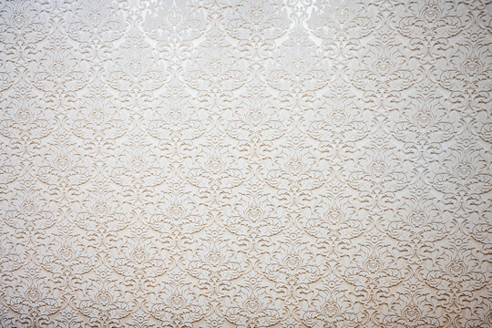 Beautiful vintage wallpaper texture background. Closeup of floral patterned wallpaper