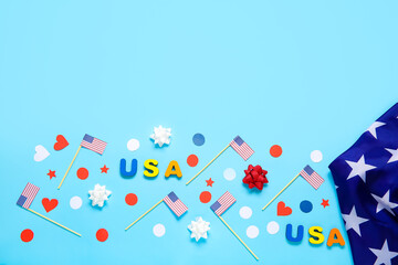 Composition with text USA, flags of America, hearts and bows on blue background. Independence Day celebration