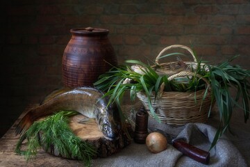 Still life with pike perch on a kitchen