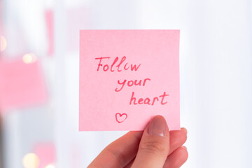inspirational quotes on pink sticker on the mirror,handwriting text