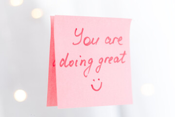 inspirational quotes on pink sticker on the mirror,handwriting text