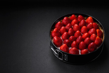 Delicious sweet cake or cheesecake with mascarpone cheese and strawberries