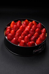 Delicious sweet cake or cheesecake with mascarpone cheese and strawberries