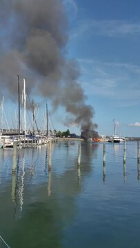 Fire. The boat is on fire at the boat station.