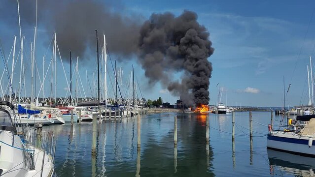 Fire. The boat is on fire at the boat station.