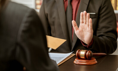 Businessman refusing money that comes with agreement paper, Anti bribery, and Anti Corruption...