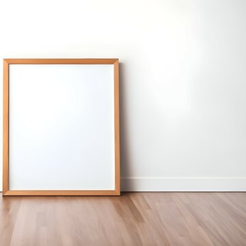 An empty picture frame on a wooden floor