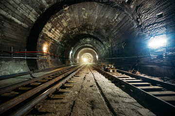 Fototapeta na wymiar Round underground subway tunnel with tubing