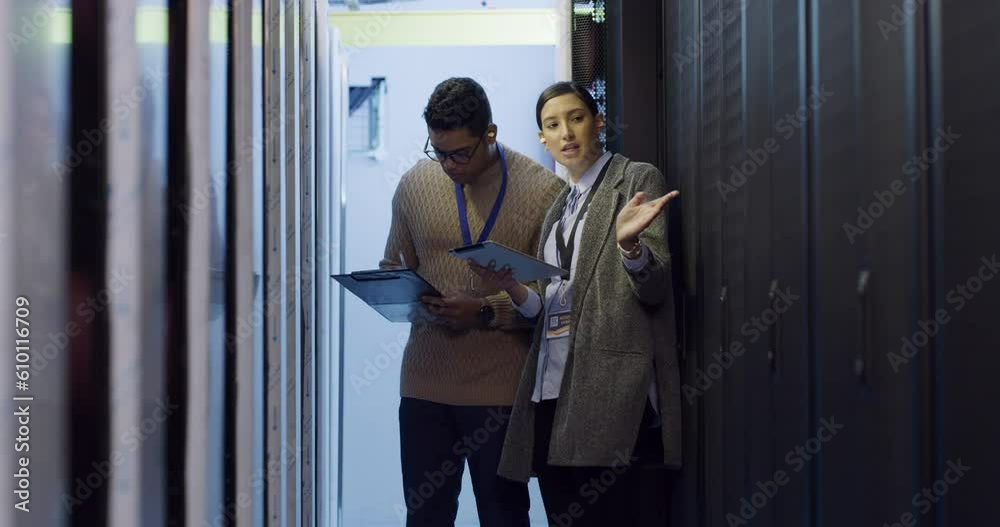 Poster Woman manager in server room with man, talking and network administration for database update. Tech employees, system maintenance and technician team problem solving online in data center together.