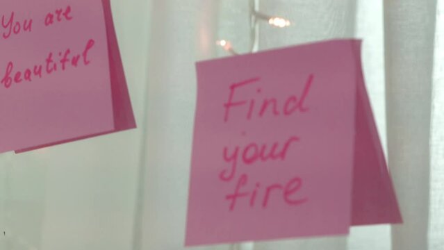 inspirational quotes on pink sticker on the mirror,handwriting text.