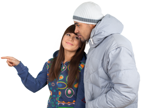 Happy young skiers couple embracing isolated on background