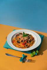 Tuna pasta on colorful background