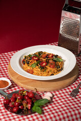 Arrabiata pasta on red background