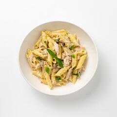 Alfredo pasta on white background top view