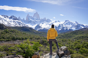 man looking at the fitz roy in argentine patagonia - obrazy, fototapety, plakaty