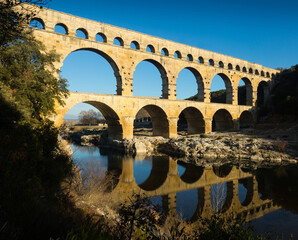 View on The Aqueduct Bridge over river in France outdoor.