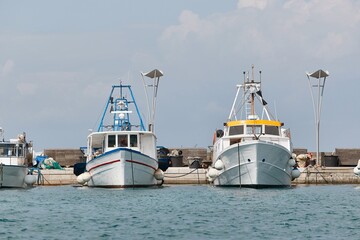 Boats docked in the marina