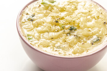 onion broth (creme de cebola), onion cream or onion soup, typical Brazilian food, typically from Brazilian cuisine, on white background with selective focus