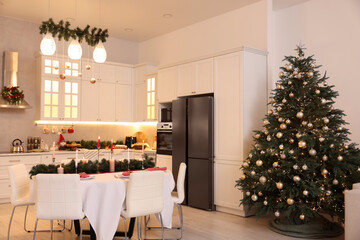 Cozy spacious kitchen decorated for Christmas. Interior design