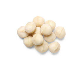 Delicious shelled Macadamia nuts isolated on white, top view