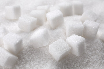 Different types of white sugar as background, closeup