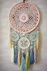 Dream catcher wall hanging decor made of colorful yarn. Generative AI