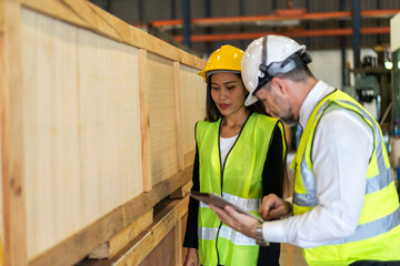 Professional team labor machanic engineer technician worker industrial work control with machine,  manufacturing, factory, production line, Indusry 4.0, robot, industrial facility.business planning