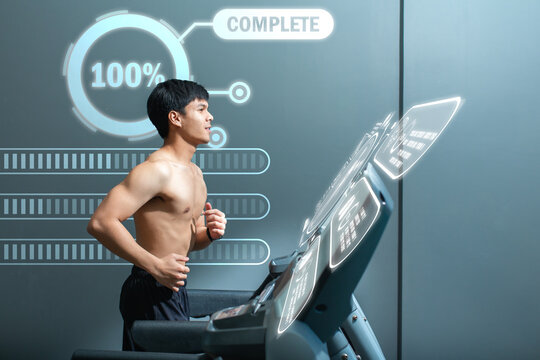 Handsome young man exercise on the treadmill with a smile, Graph shows the results of the system of the body, Health technology.