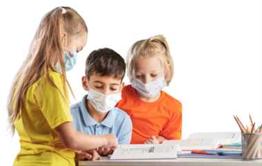 Group of children with face mask back at school after covid-19 and lockdown.