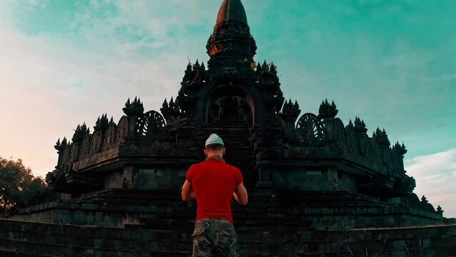 Bajra Sandhi or Monumen Taman Mumbul monument to the struggle for independence in the rays of the rising sun. Bali, Indonesia. 4K Aerial view